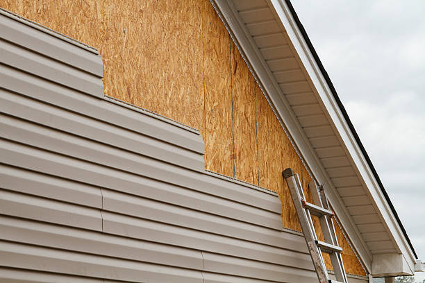 Professional Siding Replacement technician working in Lancaster, PA
